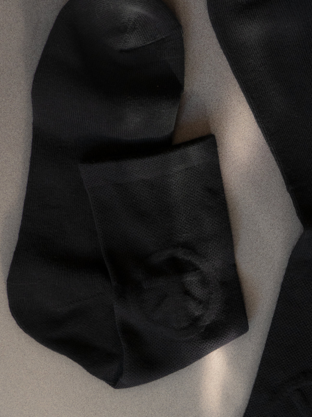 Embossed Symbol Socks - Black